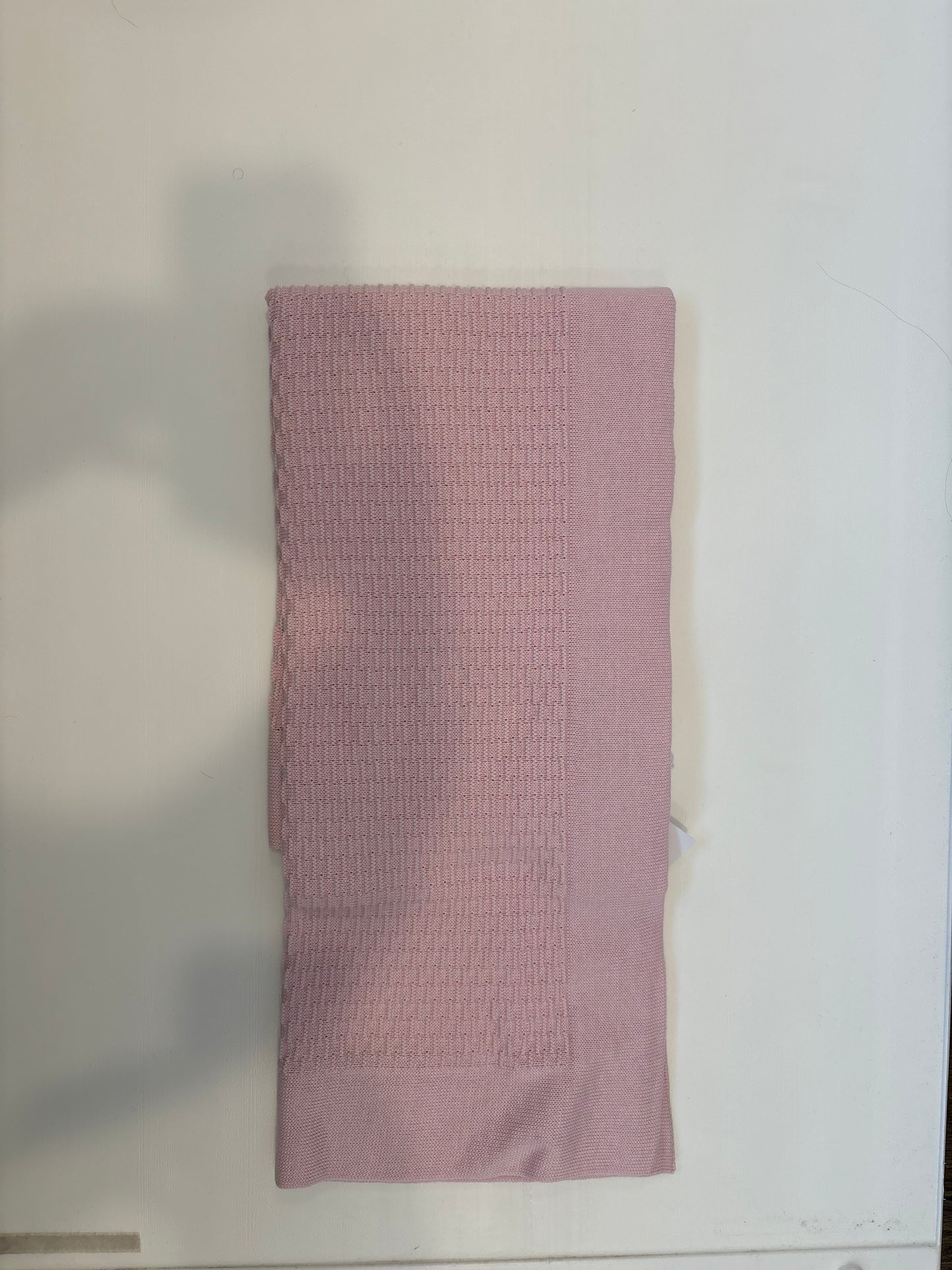 Pink wrap knit blanket