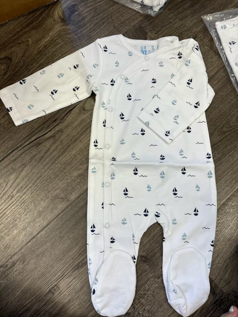 Boys sailboat footsie